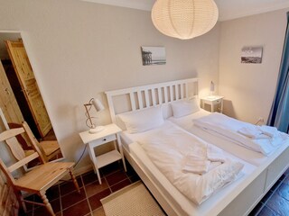 Schlafzimmer mit Doppelbett