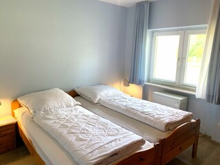 Schlafzimmer mit Doppelbett