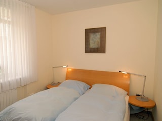 Schlafzimmer mit Doppelbett