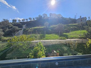 View from the balcony of the hill behind the house