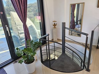Spiral staircase bedroom