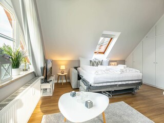 Wohnzimmer mit Schlafsofa