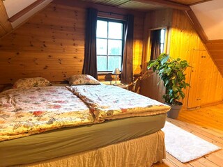 Schlafzimmer mit bequemen Betten