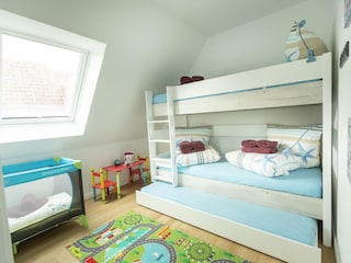 Schlafzimmer 3 mit Etagenbett und Ausziehbett