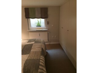 Schlafzimmer mit Einbauschrank