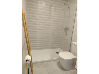 Two separate bathrooms with walkin shower