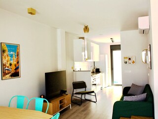 Livingroom with open kitchen