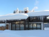 Haus im tiefen Winter