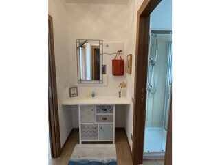 Garderobe und Dusche