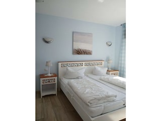 Schlafzimmer mit Doppelbett