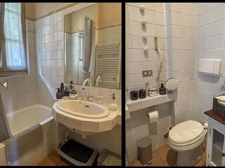 2. freundliches Badezimmer mit Sitzbadewanne (Duschmöglichkeit) und Fenster