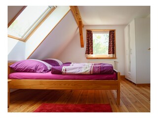 Schlafraum mit Doppelbett