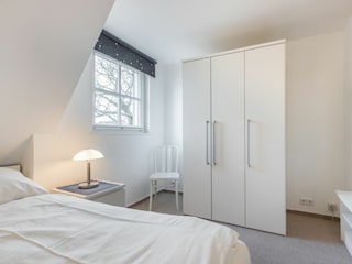 1. Schlafzimmer mit TV