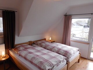 Bedroom with balcony