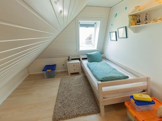 Schlafraum drei mit einem Einzelbett