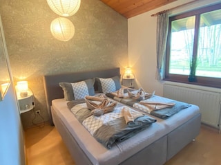 Schlafzimmer 1 mit Doppelbett 180x200