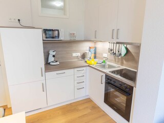 Helle L-Küchenzeile - alles da zum entspannten Kochen