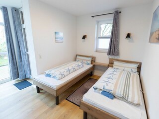 Das Schlafzimmer mit den beiden Einzelbetten