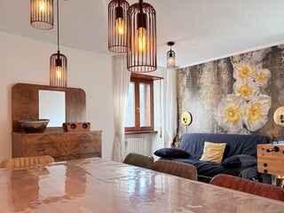 Dining room on first floor with sofa bed