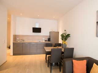 Hotel Vitus Sitzbereich mit Küche