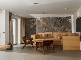 Wohnbereich mit direkten Ausgang auf die Terrasse