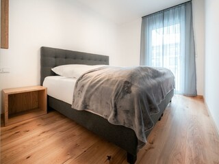 Zweites Schlafzimmer mit gemütlichen Boxspringbett