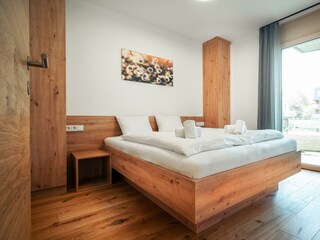 Zweites Schafzimmer mit gemütlichen Doppelbett