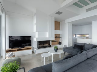 Wohnbereich mit TV, Kamin und W-LAN