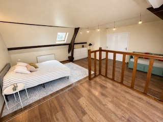 Schlafzimmer mit Doppelbett ersten Stock