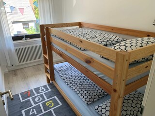 Die Kinderzimmer mit Stockbett.