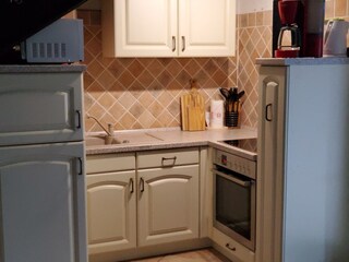 Integrierte, voll ausgestattete Küche im WohnEssbereich