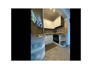 Wohn- und Esszimmer mit integrierter Küche