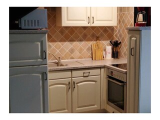 Wohn- und Esszimmer mit integrierter Küche