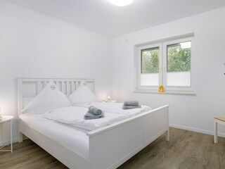 Schlafzimmer mit Doppelbett