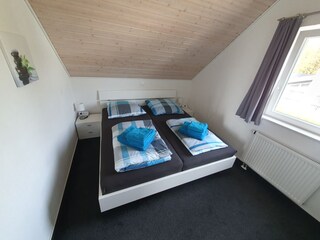 Obergeschoss Schlafzimmer 1 (Wäschepaket buchbar)