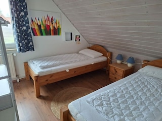 Schlafzimmer mit 2 Einzelbetten