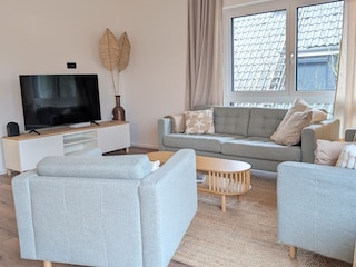 Gemütliche TV Ecke mit Platz für alle