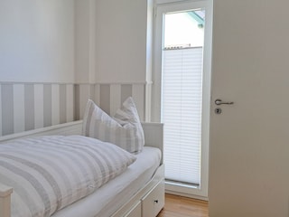 Schlafzimmer III mit Einzelbett & eigenem Badezimmer I