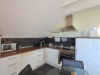 Wohn- und Essbereich mit offener Küche