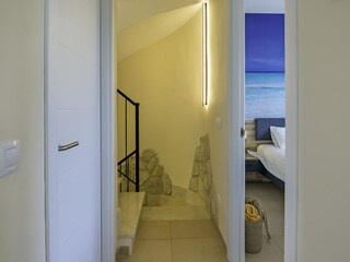 Flur (Blick ins 1. Schlafzimmer) im OG