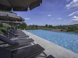 Shared pool and equipped sun terrace