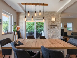 Spacious open-plan  dining area with terrace access