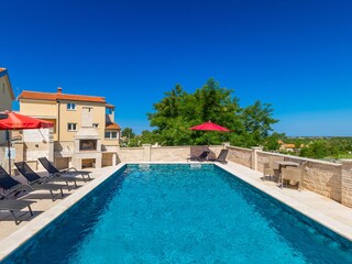 Private pool with sun loungers, outdoor seating & BBQ