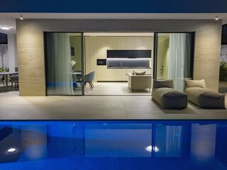 Villa D9 with private pool, sunloungers at night