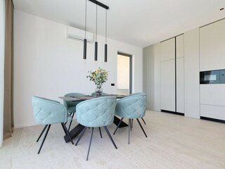 Modern dining area in villa in Pasman