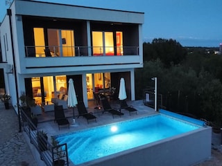 Modern villa with private pool and sun loungers