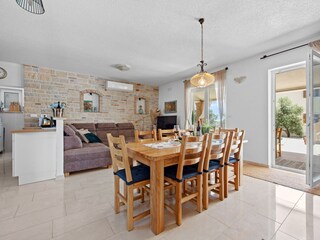 Dining area and livingroom with terrace access