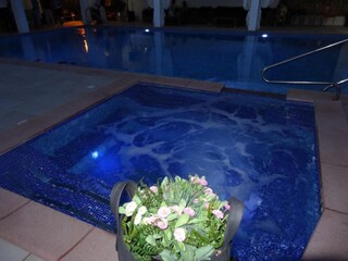 Outdoor hot tub at night in Villa Viktoria