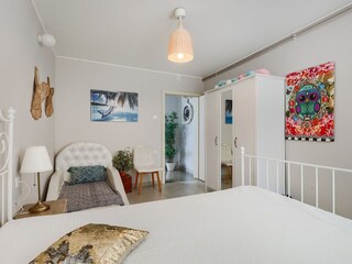 Bright bedroom with double bed,