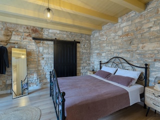 Comfortable double bedroom with warm décor